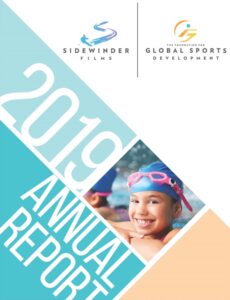 2019 annual report cover showing young girl smiling in a swimming cap and goggles